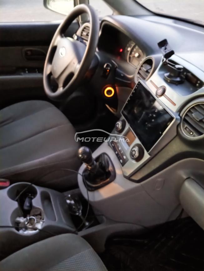 kia carens 3 diesel 8 chevaux 2009